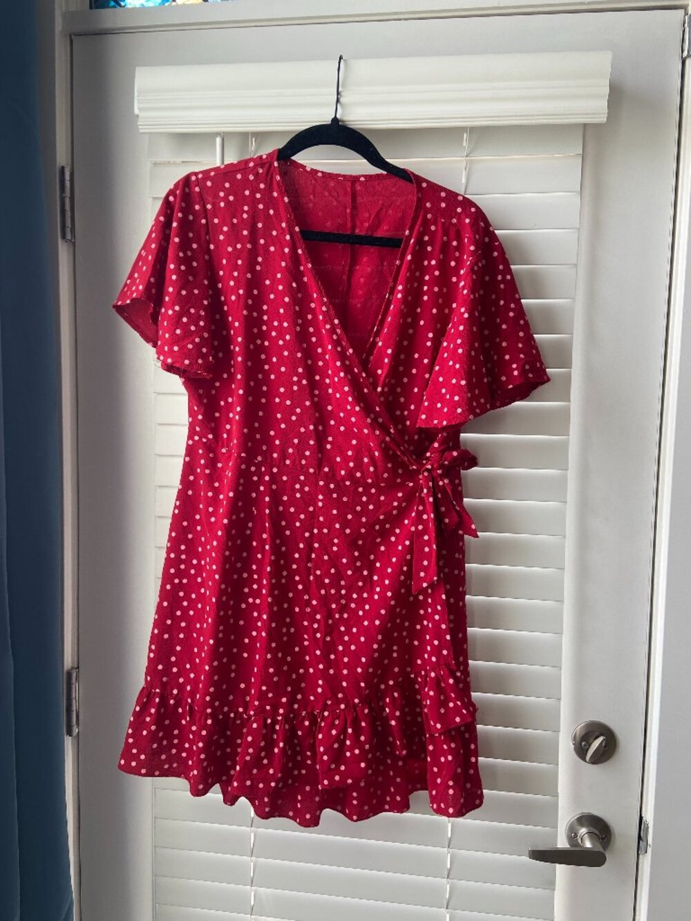 Red polka dot mini wrap dress with ruffles